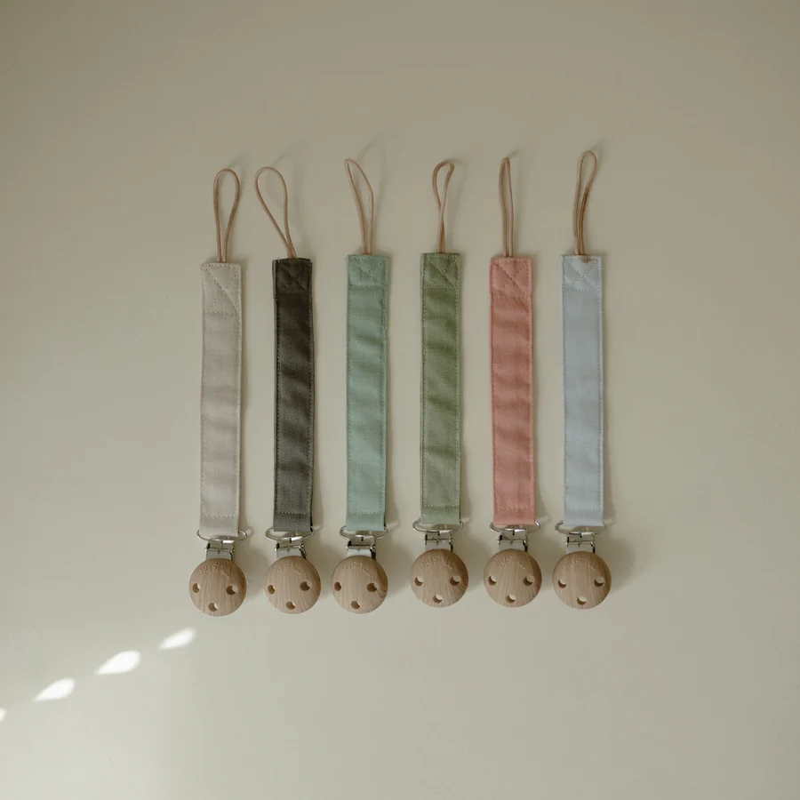 MUSHIE SILICONE PACIFIER CLIP 2 PACK - OLIVE/SHIFTING SAND